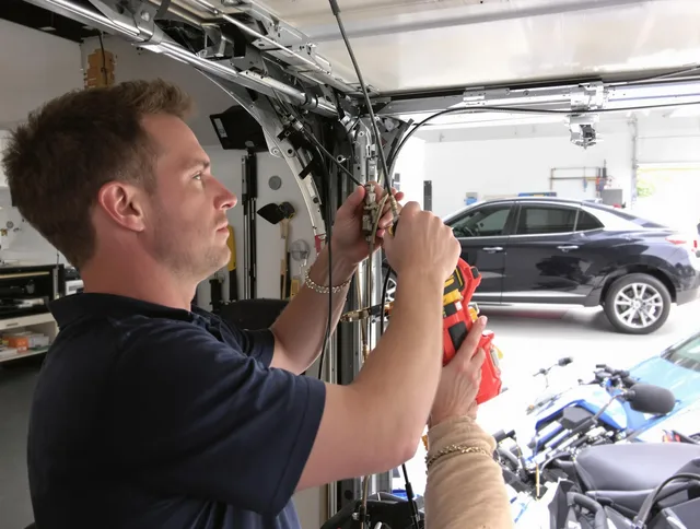 Monrovia Garage Door Repair safety certified technician performing cable replacement in Monrovia
