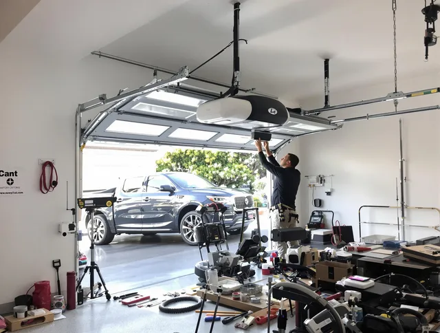 Monrovia Garage Door Repair specialist installing smart garage door opener system in Monrovia home